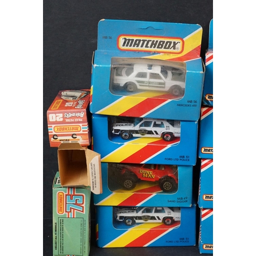 373 - Collection of 20 boxed Matchbox diecast models, mostly police and other commercial vehicles, various... 