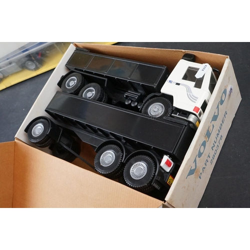 380 - Four boxed Emek-Muovio 1/25 Volvo models to include sealed 280872, FL10, fl10 Tipper with Trailer an... 