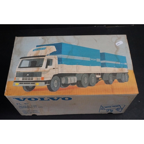 380 - Four boxed Emek-Muovio 1/25 Volvo models to include sealed 280872, FL10, fl10 Tipper with Trailer an... 