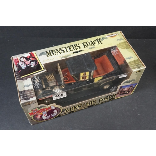 405 - Boxed American Muscle ERTL The Munsters Koach 1:18 diecast model, diecast vg, box showing storage we... 