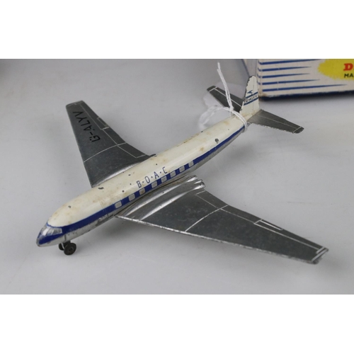 428 - Three boxed Dinky diecast model planes to include 702 DH Comet Airliner, 736 Hawker Hunter Fighter a... 