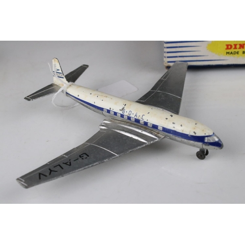 428 - Three boxed Dinky diecast model planes to include 702 DH Comet Airliner, 736 Hawker Hunter Fighter a... 