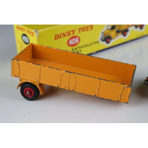 430 - Three boxed diecast models to include 2 x Dinky featuring 409 Bedford Articulated Lorry (graffiti to... 