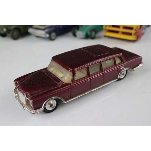 444 - Eight mid 20th C play worn diecast models to include Corgi & Dinky featuring Corgi Batmobile with Ba... 