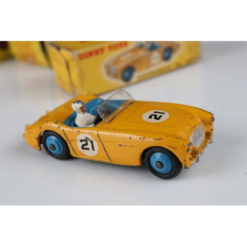 445 - Three boxed Dinky diecast models to include 109 Austin Healey 100 Sports in yellow, 676 Armoured Per... 