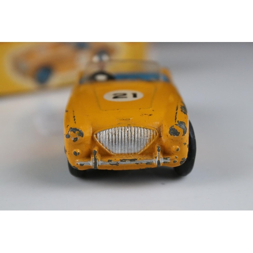 445 - Three boxed Dinky diecast models to include 109 Austin Healey 100 Sports in yellow, 676 Armoured Per... 