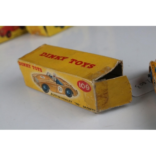 445 - Three boxed Dinky diecast models to include 109 Austin Healey 100 Sports in yellow, 676 Armoured Per... 