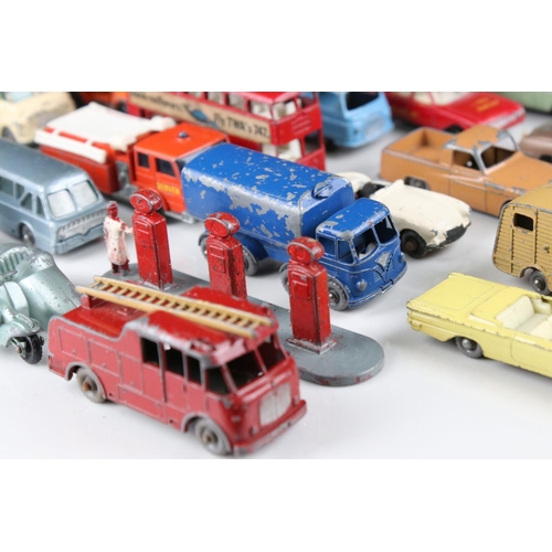 453 - Around 45 play worn mid 20th C onwards Matchbox Lesney diecast models to include road, commercial an... 