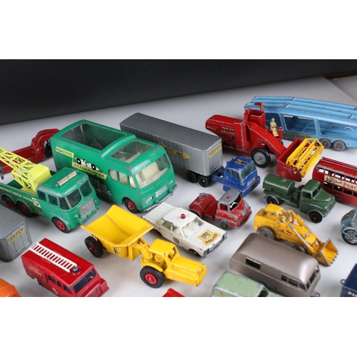 453 - Around 45 play worn mid 20th C onwards Matchbox Lesney diecast models to include road, commercial an... 