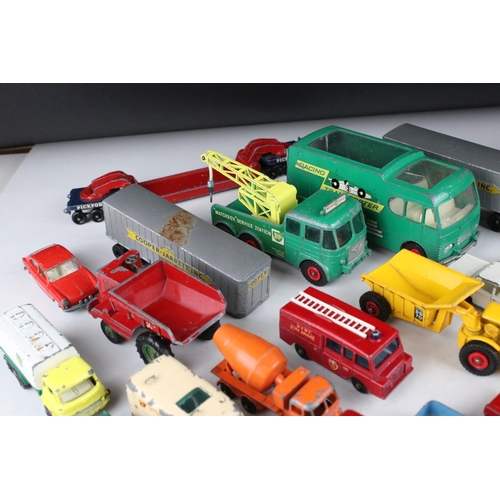 453 - Around 45 play worn mid 20th C onwards Matchbox Lesney diecast models to include road, commercial an... 