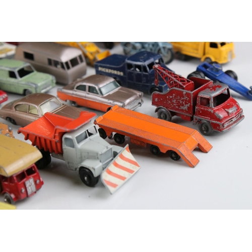 453 - Around 45 play worn mid 20th C onwards Matchbox Lesney diecast models to include road, commercial an... 