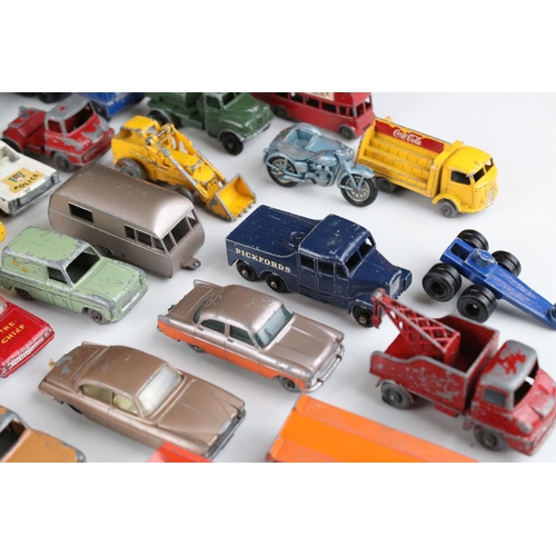 453 - Around 45 play worn mid 20th C onwards Matchbox Lesney diecast models to include road, commercial an... 