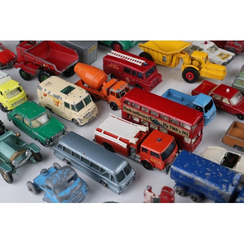 453 - Around 45 play worn mid 20th C onwards Matchbox Lesney diecast models to include road, commercial an... 