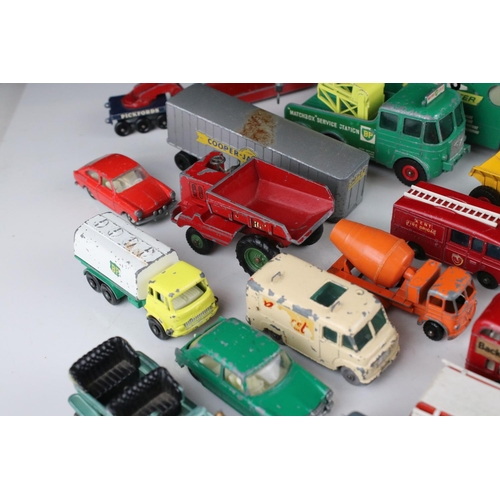 453 - Around 45 play worn mid 20th C onwards Matchbox Lesney diecast models to include road, commercial an... 