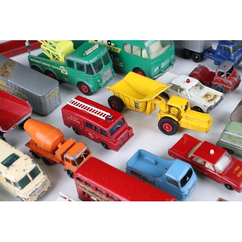 453 - Around 45 play worn mid 20th C onwards Matchbox Lesney diecast models to include road, commercial an... 