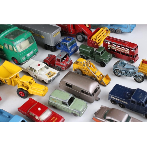 453 - Around 45 play worn mid 20th C onwards Matchbox Lesney diecast models to include road, commercial an... 