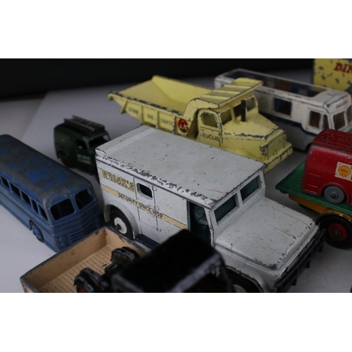 454 - Around 20 play worn mid 20th C onwards Dinky diecast commercial models to include 275 Brinks Armoure... 