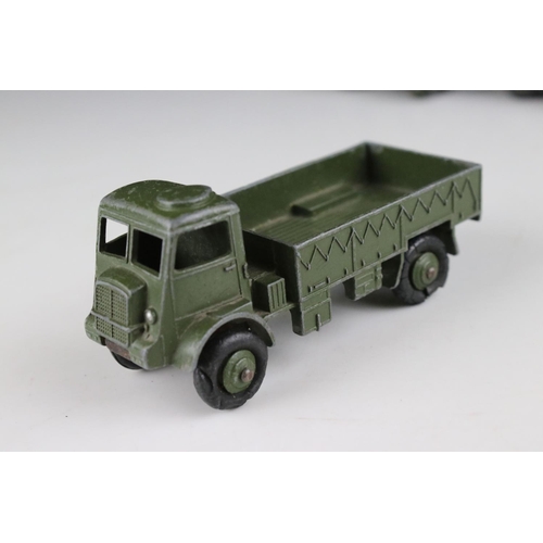 455 - 11 Mid 20th C Dinky military diecast models to include 660 Tank Transporter, 626 Military Ambulance ... 