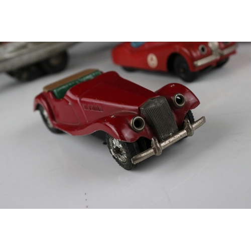 456 - Five mid 20th C models to include Schuco tin plate Jaguar XK120 in red, Scalex tin plate MG TF in re... 