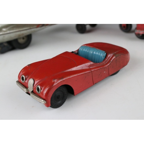 456 - Five mid 20th C models to include Schuco tin plate Jaguar XK120 in red, Scalex tin plate MG TF in re... 