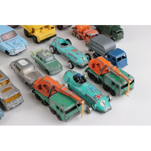 457 - Around 35 mid 20th play worn diecast models to include Matchbox Lesney, Dinky & Corgi featuring Corg... 