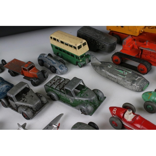 460 - Around 32 mid 20th C play worn diecast models to include Timpo & Dinky commercial, planes and road e... 