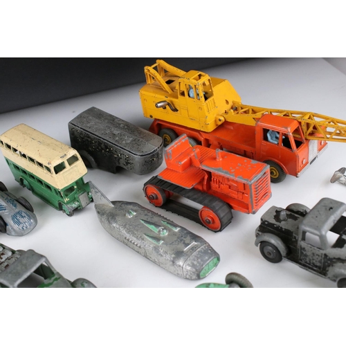 460 - Around 32 mid 20th C play worn diecast models to include Timpo & Dinky commercial, planes and road e... 