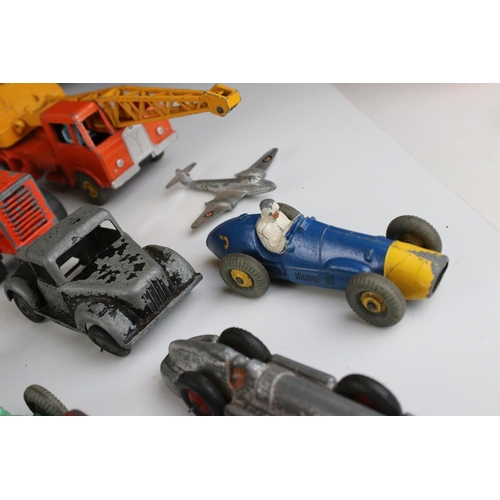 460 - Around 32 mid 20th C play worn diecast models to include Timpo & Dinky commercial, planes and road e... 