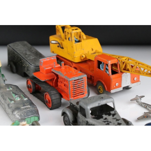 460 - Around 32 mid 20th C play worn diecast models to include Timpo & Dinky commercial, planes and road e... 