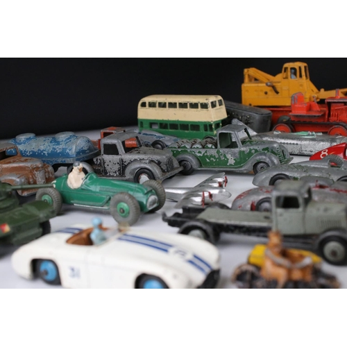 460 - Around 32 mid 20th C play worn diecast models to include Timpo & Dinky commercial, planes and road e... 