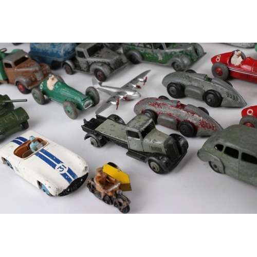 460 - Around 32 mid 20th C play worn diecast models to include Timpo & Dinky commercial, planes and road e... 