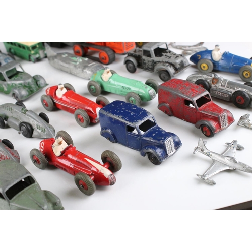 460 - Around 32 mid 20th C play worn diecast models to include Timpo & Dinky commercial, planes and road e... 