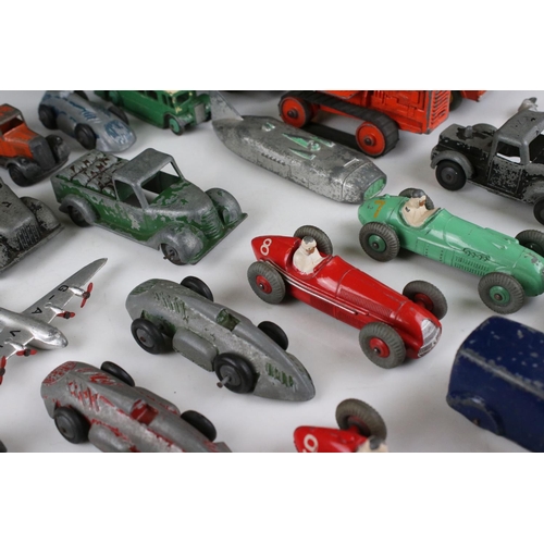 460 - Around 32 mid 20th C play worn diecast models to include Timpo & Dinky commercial, planes and road e... 