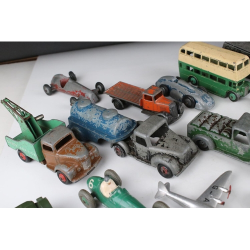 460 - Around 32 mid 20th C play worn diecast models to include Timpo & Dinky commercial, planes and road e... 