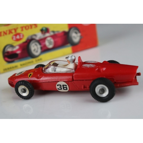 496 - Two boxed Dinky diecast models to include 243 BRM Racing Car in metallic green & 242 Ferrari Racing ... 