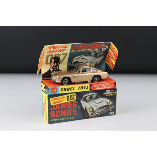 512 - Boxed Corgi 261 James Bond Aston Martin DB5 diecast model with secret instructions, paper bag and 2 ... 