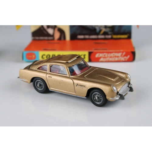 512 - Boxed Corgi 261 James Bond Aston Martin DB5 diecast model with secret instructions, paper bag and 2 ... 