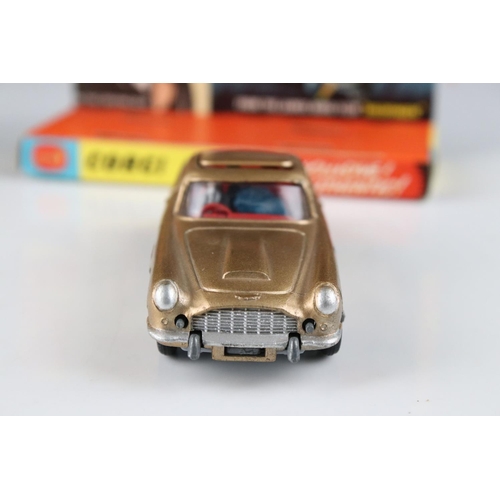 512 - Boxed Corgi 261 James Bond Aston Martin DB5 diecast model with secret instructions, paper bag and 2 ... 