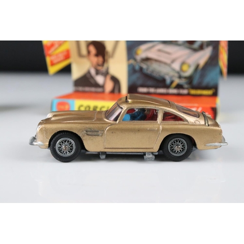 512 - Boxed Corgi 261 James Bond Aston Martin DB5 diecast model with secret instructions, paper bag and 2 ... 