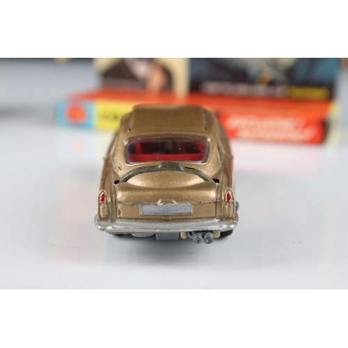 512 - Boxed Corgi 261 James Bond Aston Martin DB5 diecast model with secret instructions, paper bag and 2 ... 