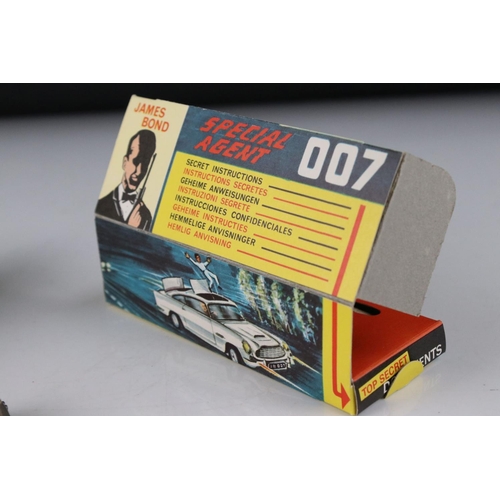 512 - Boxed Corgi 261 James Bond Aston Martin DB5 diecast model with secret instructions, paper bag and 2 ... 