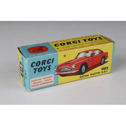 515 - Two boxed Corgi diecast models to include 218 Aston Martin DB4 in yellow with red interior and 219 P... 