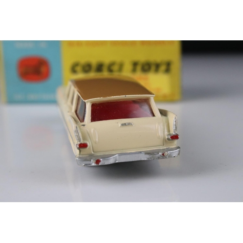 515 - Two boxed Corgi diecast models to include 218 Aston Martin DB4 in yellow with red interior and 219 P... 