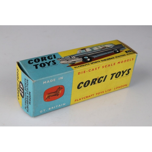 515 - Two boxed Corgi diecast models to include 218 Aston Martin DB4 in yellow with red interior and 219 P... 