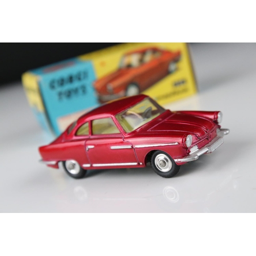 520 - Two boxed Corgi diecast models to include 316 NSU Sports Prinz in metallic cerise (excellent) and 31... 