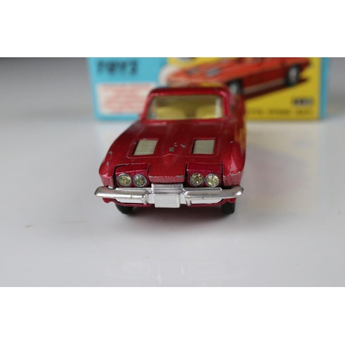 520 - Two boxed Corgi diecast models to include 316 NSU Sports Prinz in metallic cerise (excellent) and 31... 