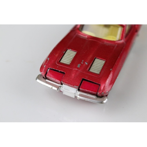 520 - Two boxed Corgi diecast models to include 316 NSU Sports Prinz in metallic cerise (excellent) and 31... 