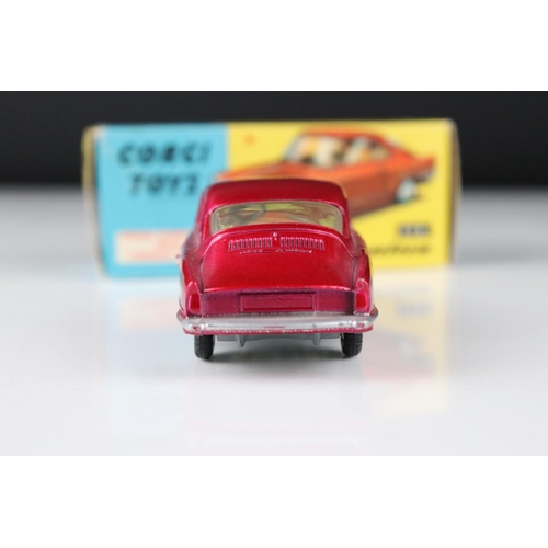 520 - Two boxed Corgi diecast models to include 316 NSU Sports Prinz in metallic cerise (excellent) and 31... 