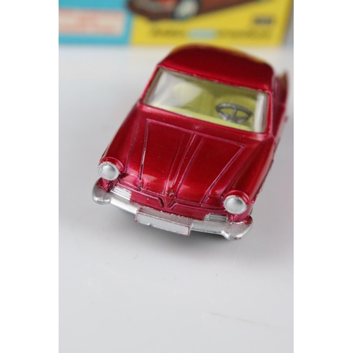 520 - Two boxed Corgi diecast models to include 316 NSU Sports Prinz in metallic cerise (excellent) and 31... 