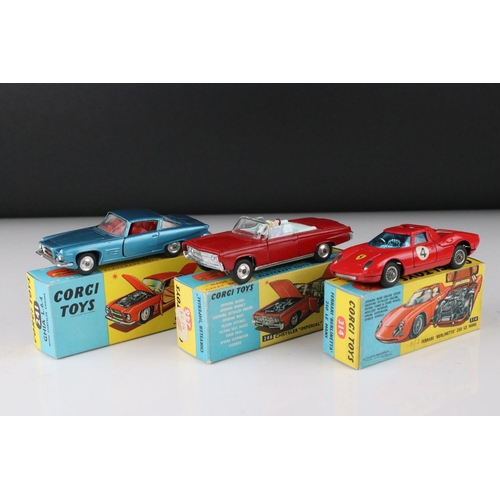 521 - Three boxed Corgi diecast models to include 241 Ghia L6.4 in metallic blue, 314 Ferrari Berlinetta 2... 